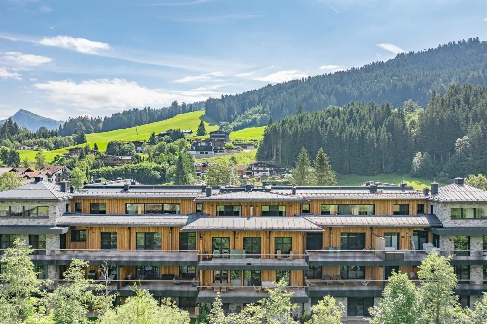 KITZIMMO-Riverside - Luxus-Garden-Suite in Toplage kaufen - Immobilien Kirchberg.