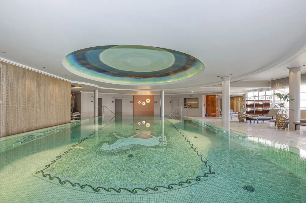 KITZIMMO-Luxus-Suite mit Zugang in ein 5-Sterne-Hotel - Immobilien Kitzbühel.