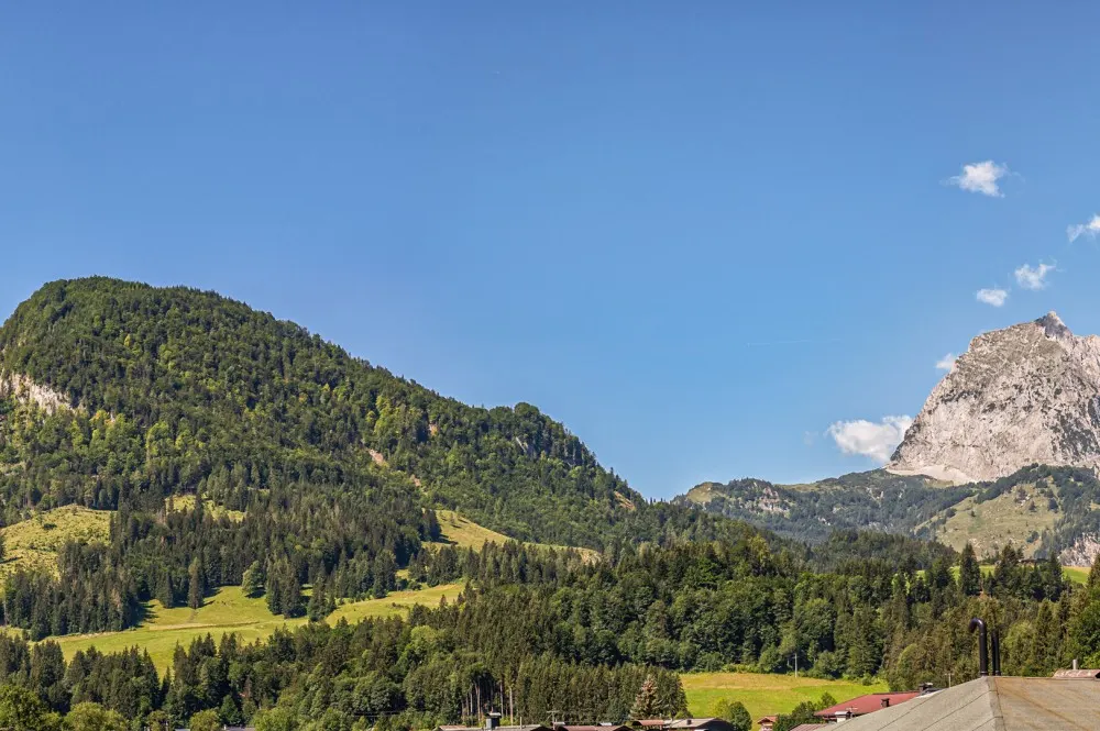 KITZIMMO-Baugrundstück mit Baugenehmigung kaufen - Immobilien Kirchdorf in Tirol.