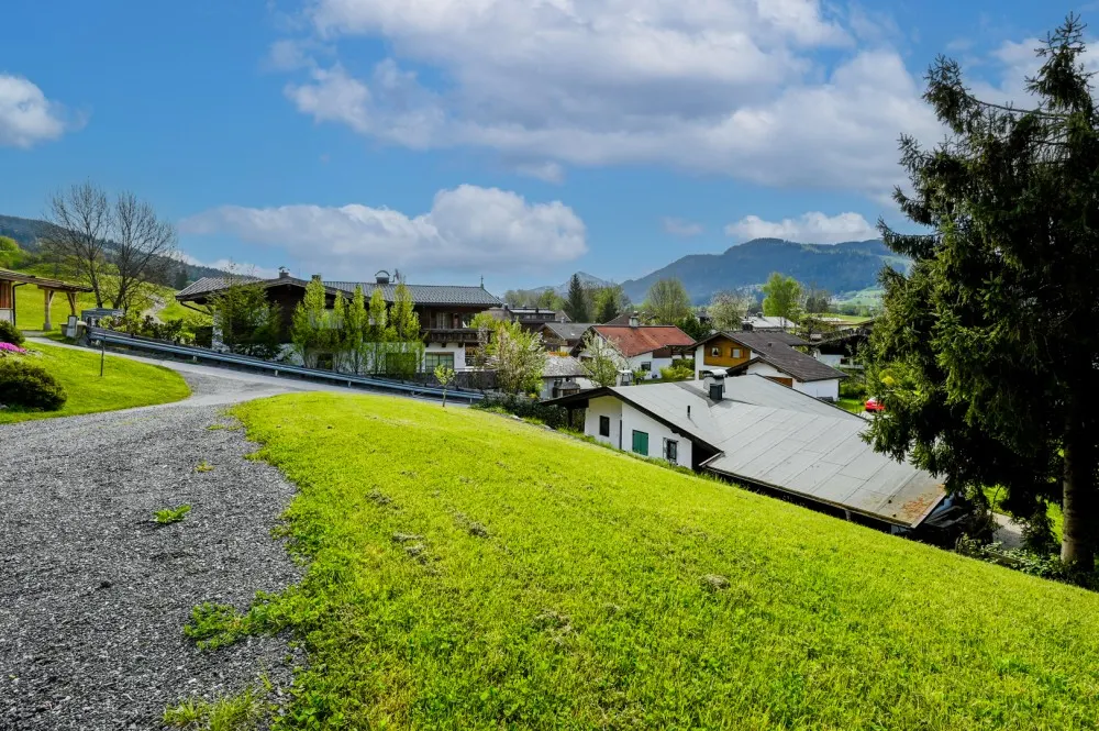 KITZIMMO-Unbebautes Grundstück in sonniger Ruhelage kaufen - Immobilien Ellmau.