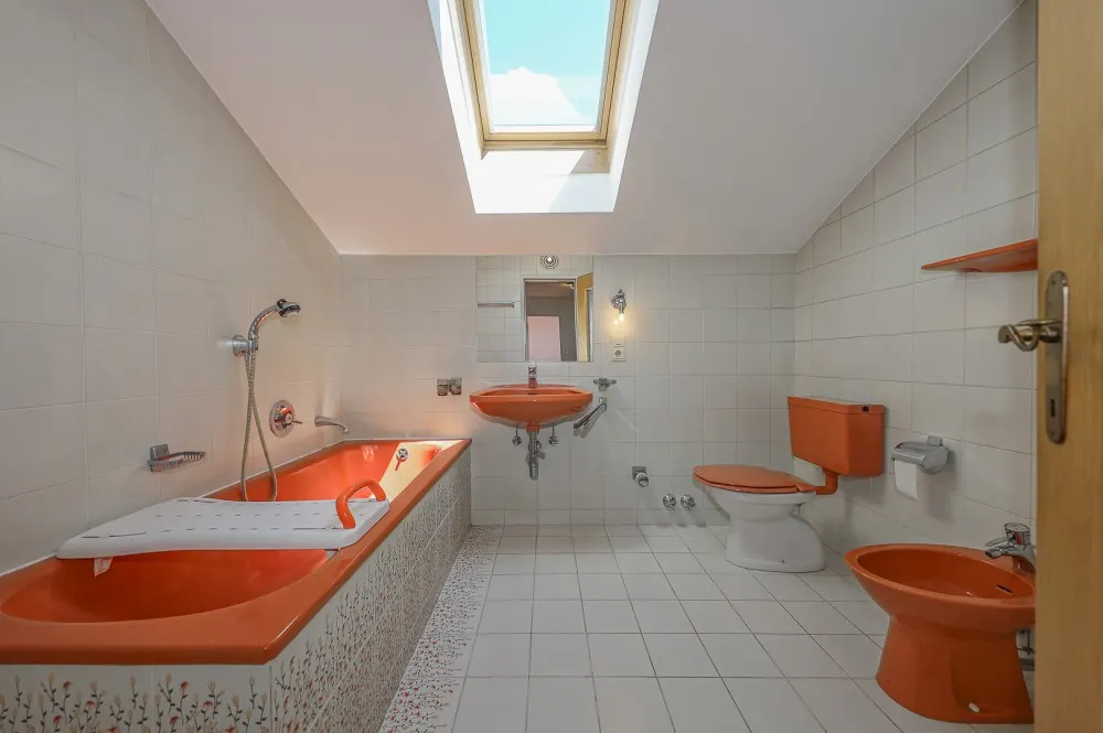 KITZIMMO-Dachgeschosswohnung in Ruhelage mit Kaiserblick kaufen - Immobilien Oberndorf.