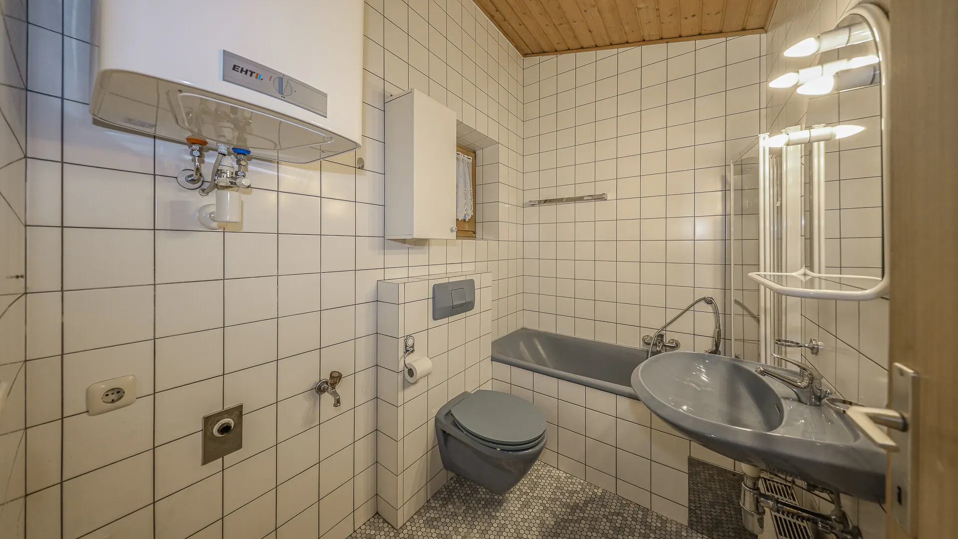 KITZIMMO-Dachgeschosswohnung mit Bergblick kaufen - Immobilien Kitzbühel.