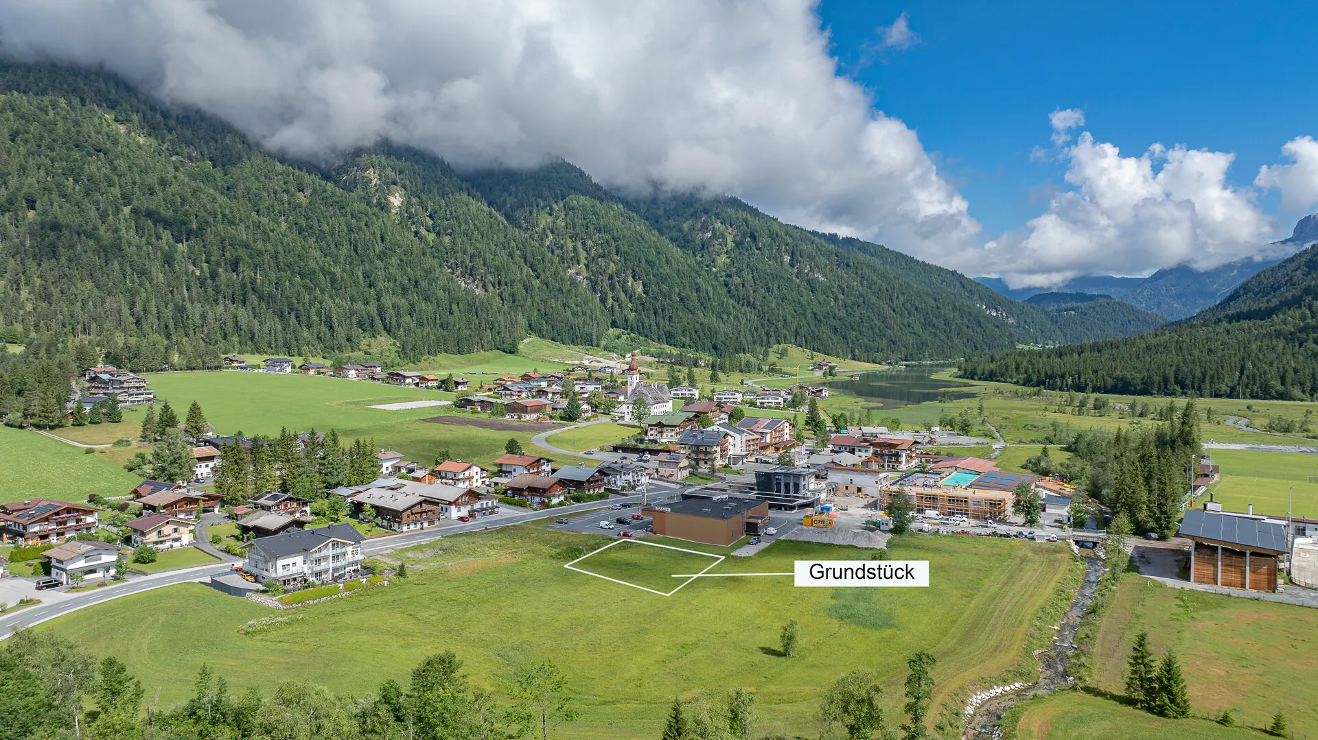 KITZIMMO-Grundstück mit Baugenehmigung für 15 Wohnungen & 1 Geschäft - Immobilien St. Ulrich.